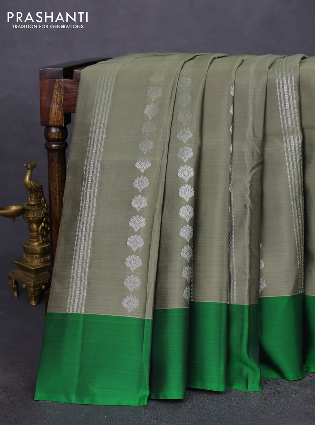 Kanchipuram silk saree elaichi green and green with allover silver zari weaves and simple border