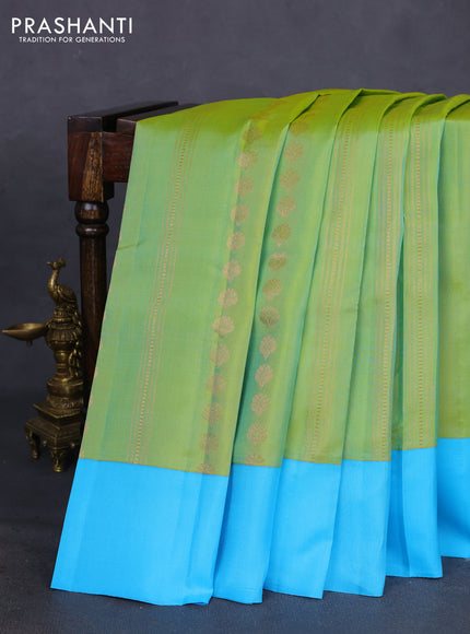 Kanchipuram silk saree dual shade of light green and light blue with allover copper zari weaves and simple border