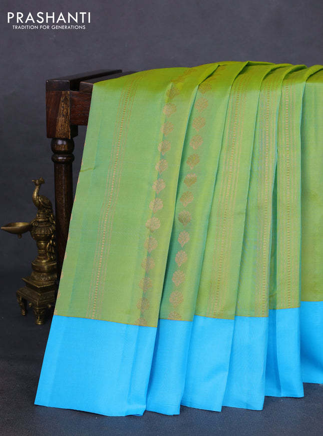 Kanchipuram silk saree dual shade of light green and light blue with allover copper zari weaves and simple border