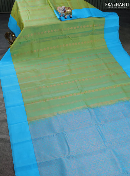 Kanchipuram silk saree dual shade of light green and light blue with allover copper zari weaves and simple border
