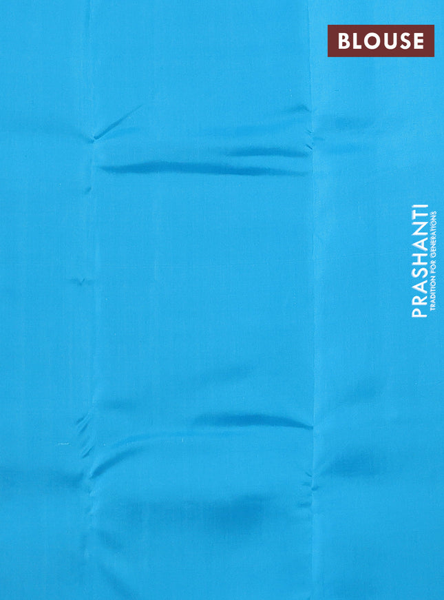 Kanchipuram silk saree dual shade of light green and light blue with allover copper zari weaves and simple border