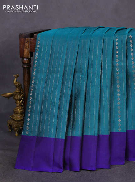 Kanchipuram silk saree teal green and blue with allover copper zari weaves and simple border