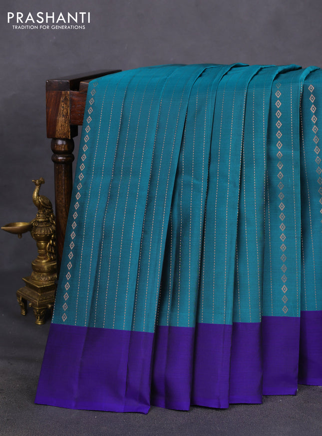 Kanchipuram silk saree teal green and blue with allover copper zari weaves and simple border