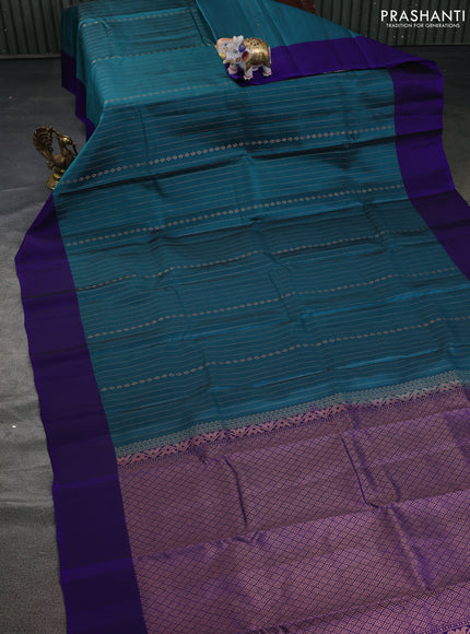 Kanchipuram silk saree teal green and blue with allover copper zari weaves and simple border