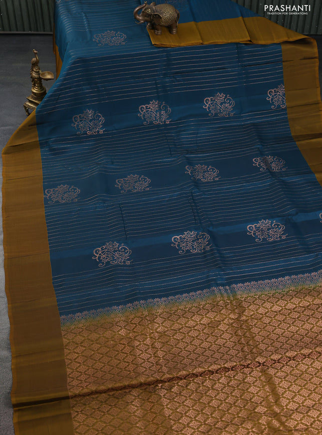 Kanchipuram silk saree peacock blue and dark mustard with allover copper zari weaves and simple border