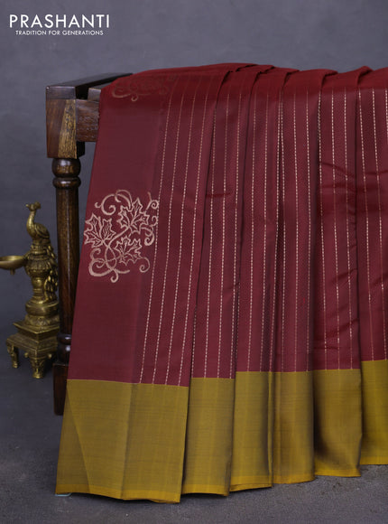 Kanchipuram silk saree maroon and dark mustard with allover copper zari weaves and simple border