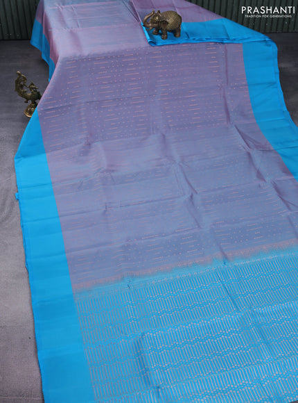 Kanchipuram silk saree dual shade of pastel pink and teal blue with allover copper zari woven butta weaves and simple border