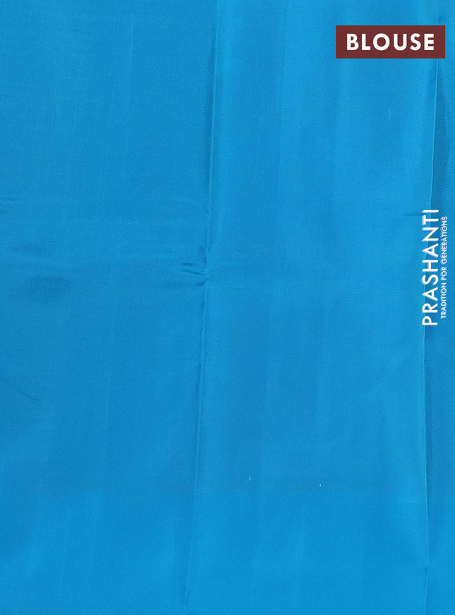 Kanchipuram silk saree dual shade of pastel pink and teal blue with allover copper zari woven butta weaves and simple border