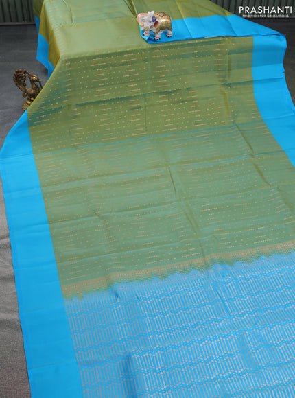Kanchipuram silk saree dual shade of green and cs blue with allover copper zari woven butta weaves and simple border