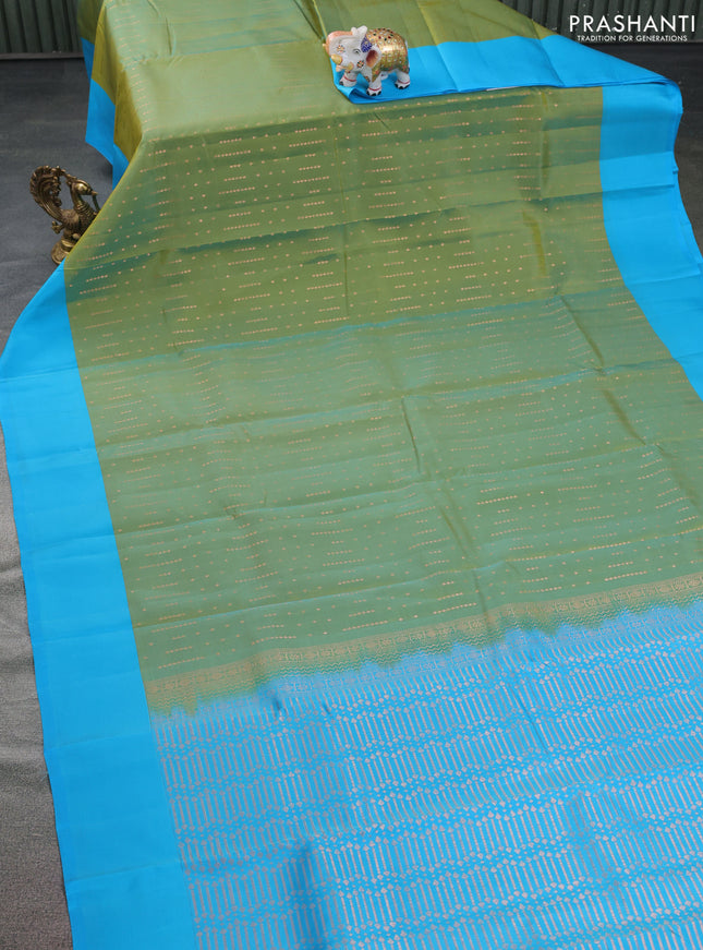 Kanchipuram silk saree dual shade of green and cs blue with allover copper zari woven butta weaves and simple border