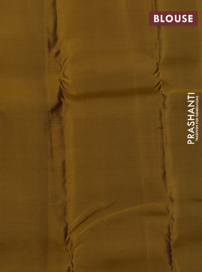 Kanchipuram silk saree peacock blue and dark mustard with copper zari woven buttas and self emboss border