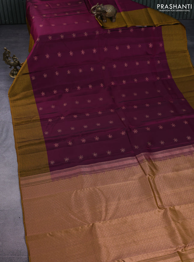 Kanchipuram silk saree dark magenta pink and dark mustard with copper zari woven buttas and self emboss border