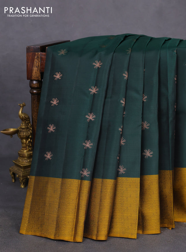 Kanchipuram silk saree bottle green and dark mustard with copper zari woven buttas and self emboss border
