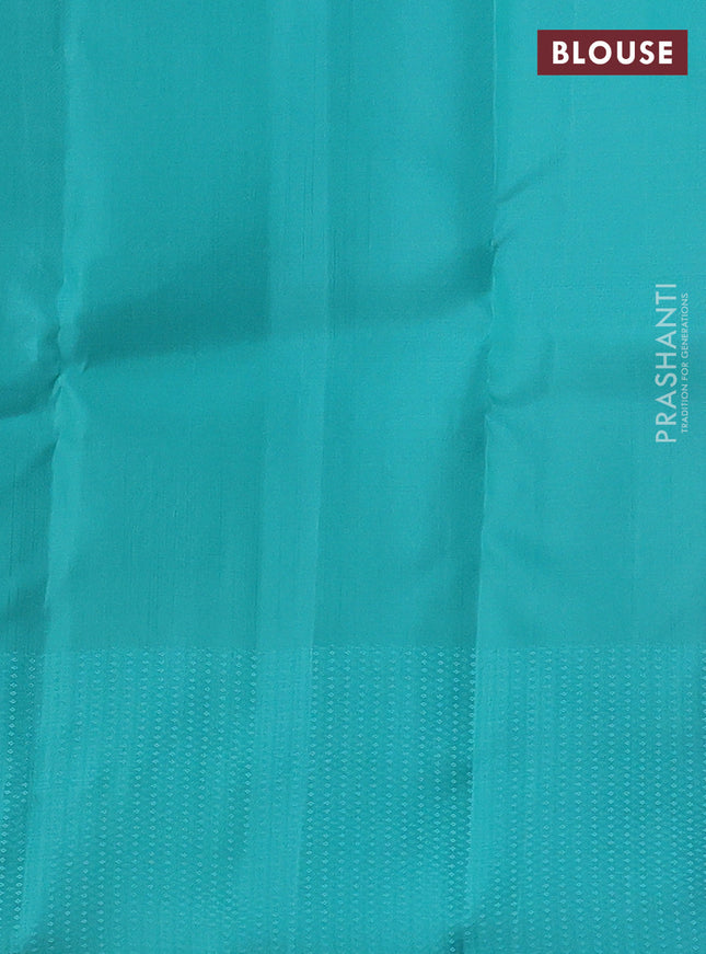 Kanchipuram silk saree purple and teal blue with allover self emboss and copper zari woven buttas