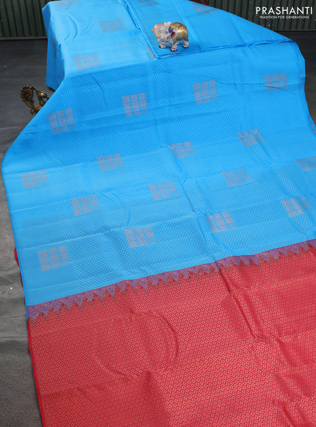 Kanchipuram silk saree light blue and red with allover self emboss & copper zari buttas in borderless style