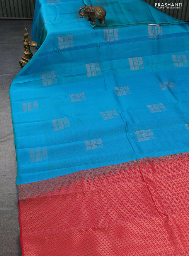 Kanchipuram silk saree teal bluish green and reddish orange with allover self emboss & copper zari buttas in borderless style
