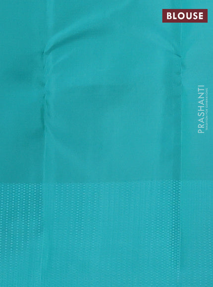 Kanchipuram silk saree grey and teal blue with allover self emboss and copper zari woven butta border