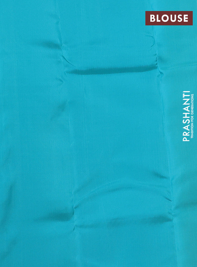 Kanchipuram silk saree mustard yellow and teal blue with allover self emboss and copper zari woven butta border