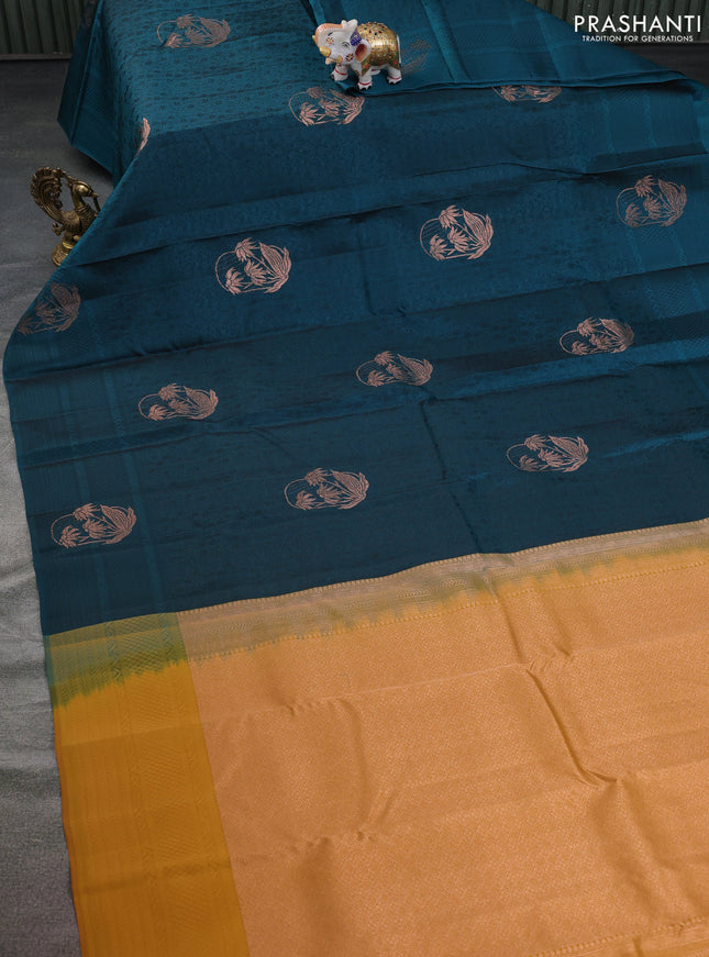 Kanchipuram silk saree peacock green and mustard yellow with allover self emboss & copper zari buttas and self emboss border