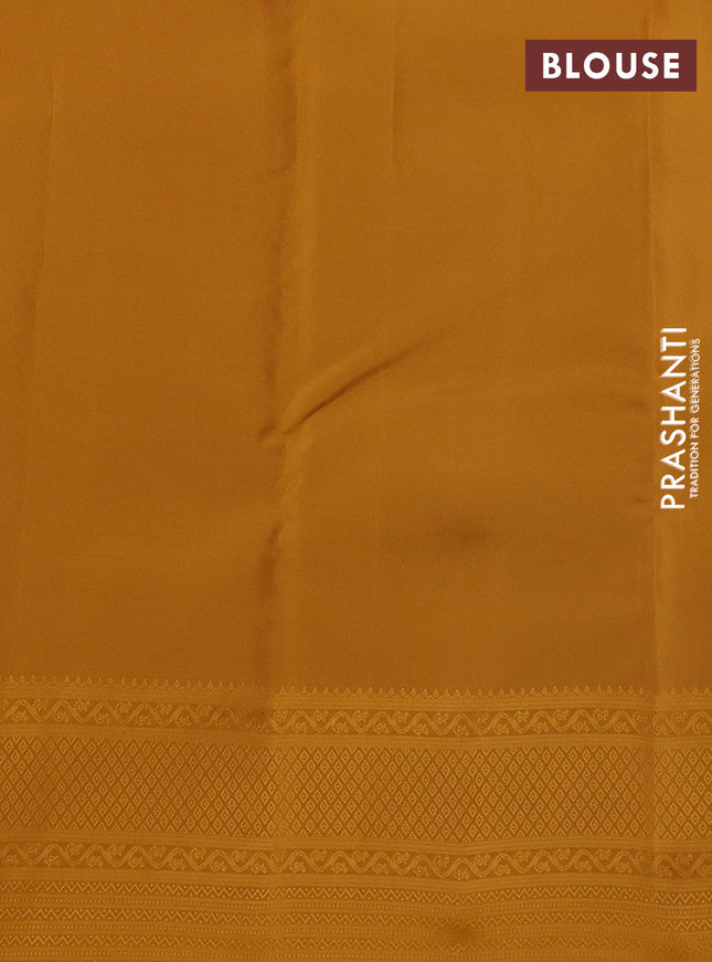 Kanchipuram silk saree peacock green and mustard yellow with allover self emboss & copper zari buttas and self emboss border