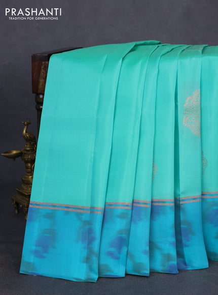 Kanchipuram silk saree teal green shade and teal blue with copper zari weaves & buttas and copper zari woven ikat style border
