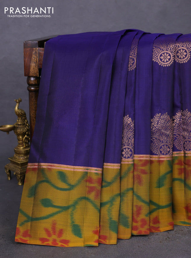 Kanchipuram silk saree blue and dark mustard with copper zari weaves & buttas and copper zari woven ikat style border