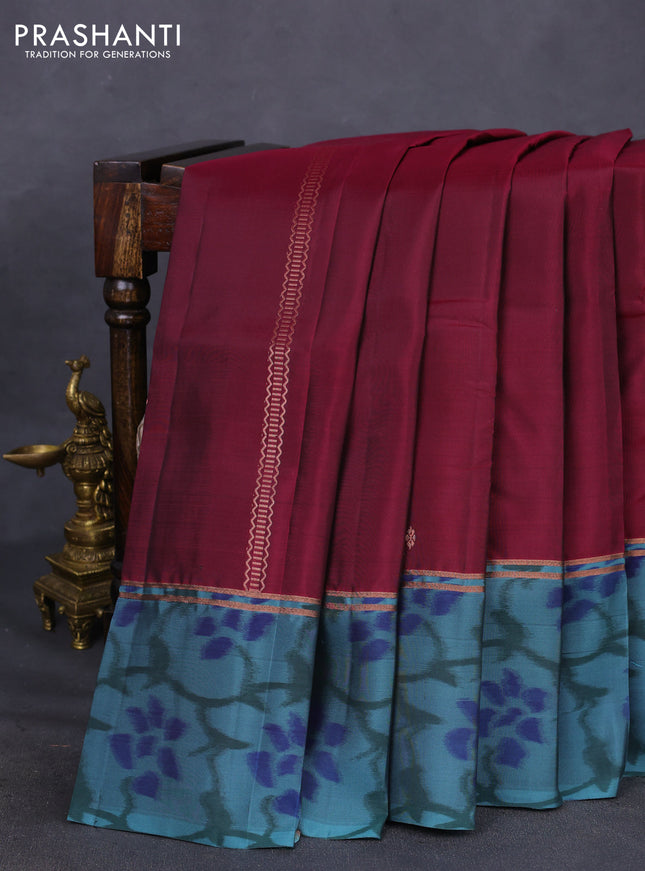 Kanchipuram silk saree dark magenta pink and pastel blue with copper zari weaves & buttas and copper zari woven ikat style border