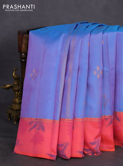 Kanchipuram silk saree dual shade of blue and peach shade with copper zari weaves & buttas and copper zari woven ikat style border