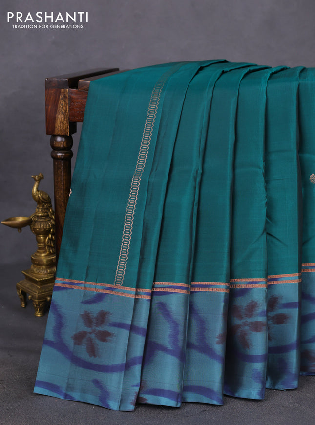 Kanchipuram silk saree peacock green and pastel blue with copper zari weaves & buttas and copper zari woven ikat style border