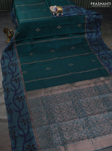 Kanchipuram silk saree peacock green and pastel blue with copper zari weaves & buttas and copper zari woven ikat style border