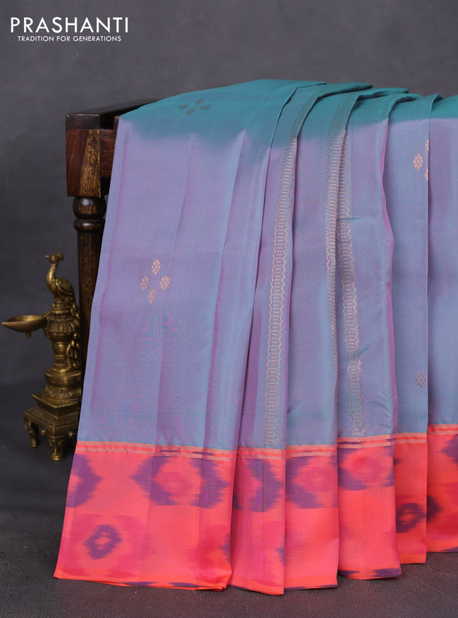 Kanchipuram silk saree dual shade of pastel blue and peach shade with copper zari weaves & buttas and copper zari woven ikat style border