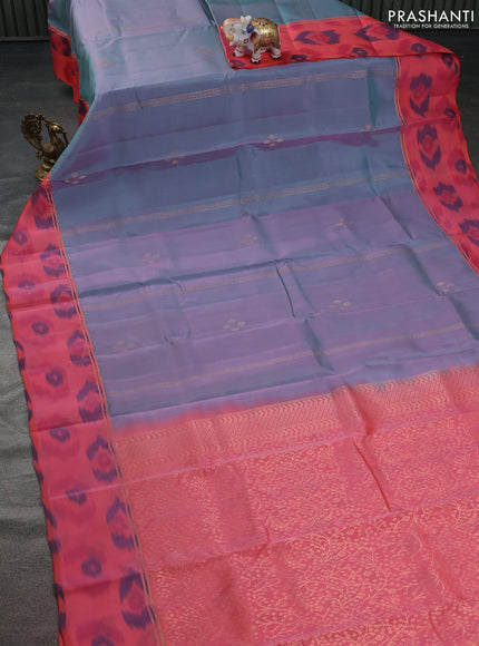 Kanchipuram silk saree dual shade of pastel blue and peach shade with copper zari weaves & buttas and copper zari woven ikat style border
