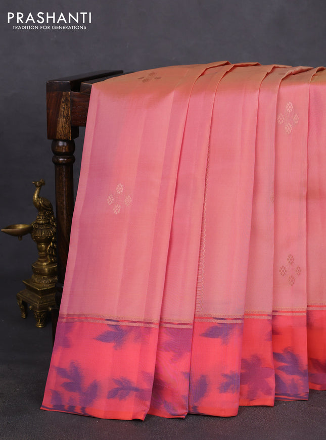 Kanchipuram silk saree pastel peach and peach shade with copper zari weaves & buttas and copper zari woven ikat style border