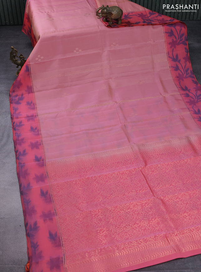 Kanchipuram silk saree pastel peach and peach shade with copper zari weaves & buttas and copper zari woven ikat style border