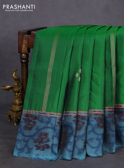 Kanchipuram silk saree green and pastel blue with copper zari weaves & buttas and copper zari woven ikat style border