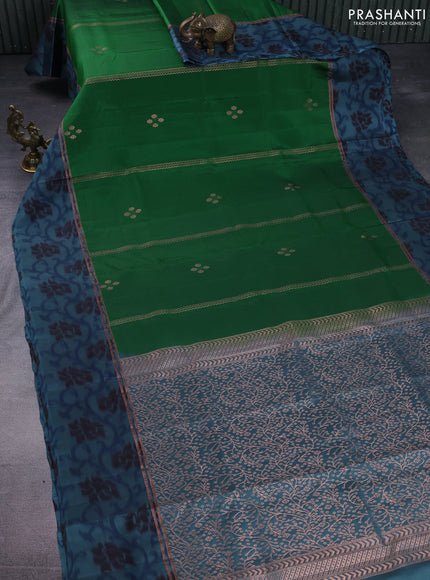 Kanchipuram silk saree green and pastel blue with copper zari weaves & buttas and copper zari woven ikat style border
