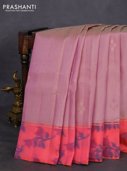 Kanchipuram silk saree dual shade of pastel pink and peach pink with copper zari woven buttas and copper zari woven ikat style border
