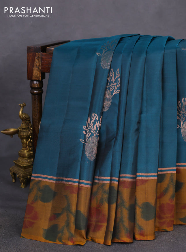 Kanchipuram silk saree peacock blue and dark mustard with copper zari woven buttas and copper zari woven ikat style border