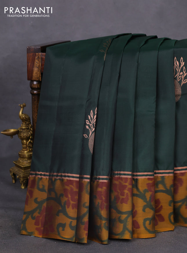 Kanchipuram silk saree bottle green and dark mustard with copper zari woven buttas and copper zari woven ikat style border