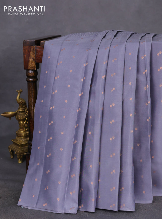 Kanchipuram silk saree grey and teal green shade with half & half style and long zari woven butta border