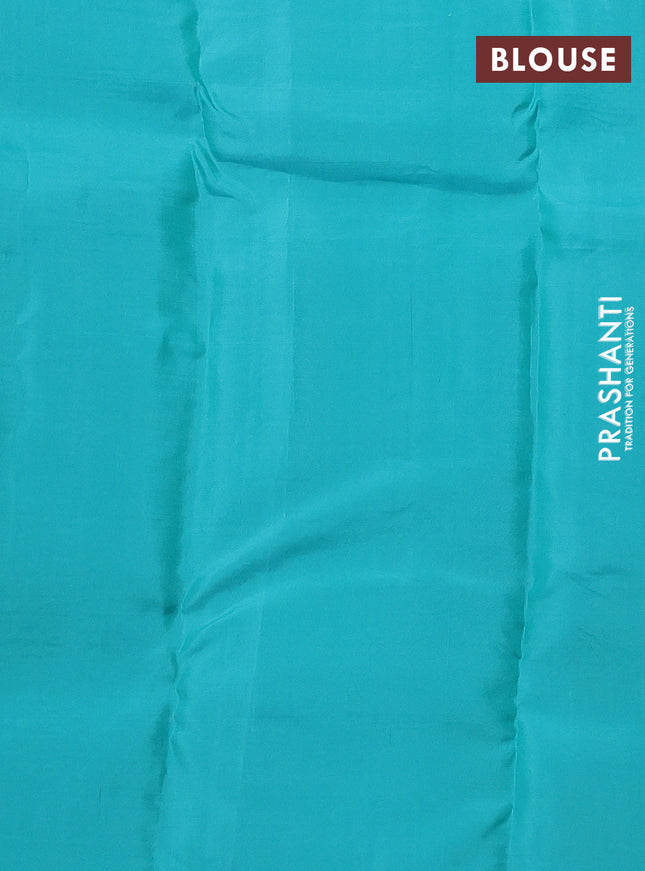 Kanchipuram silk saree grey and teal green shade with half & half style and long zari woven butta border