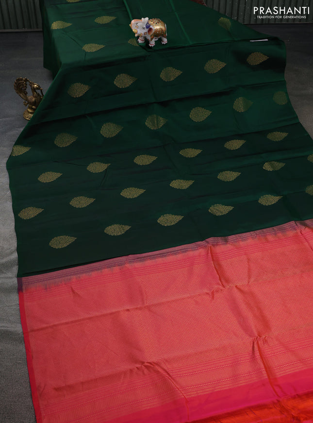 Kanchipuram silk saree green and dual shade of pinkish orange with copper zari woven buttas in borderless style
