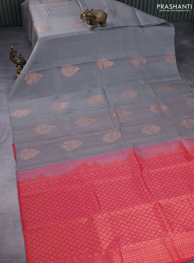Kanchipuram silk saree grey and dual shade of pinkish orange with copper zari woven buttas in borderless style