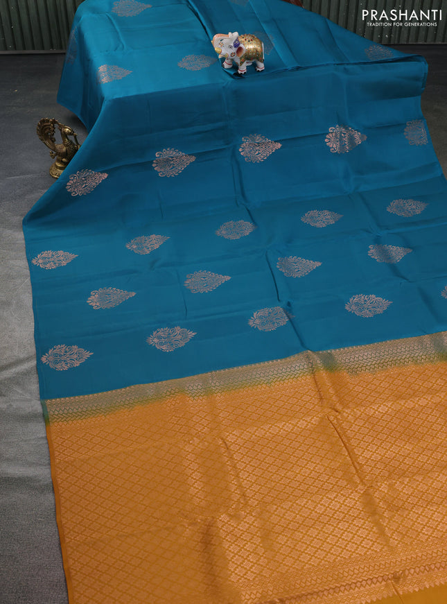 Kanchipuram silk saree peacock green and dark mustard with copper zari woven buttas in borderless style