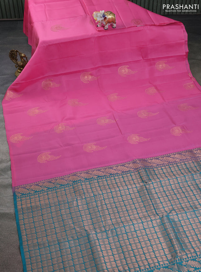 Kanchipuram silk saree light pink and teal blue shade with copper zari woven buttas in borderless style
