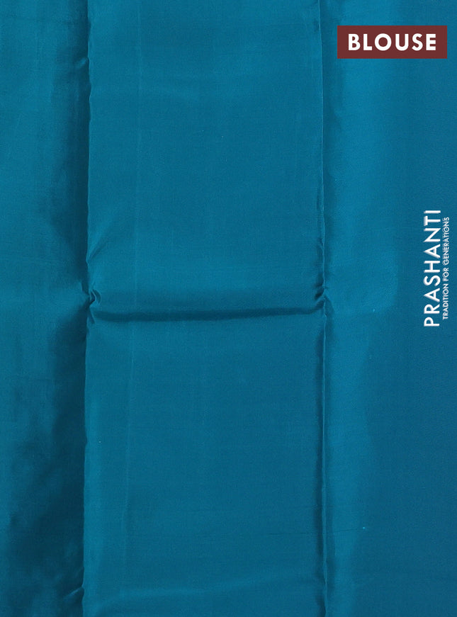 Kanchipuram silk saree light pink and teal blue shade with copper zari woven buttas in borderless style