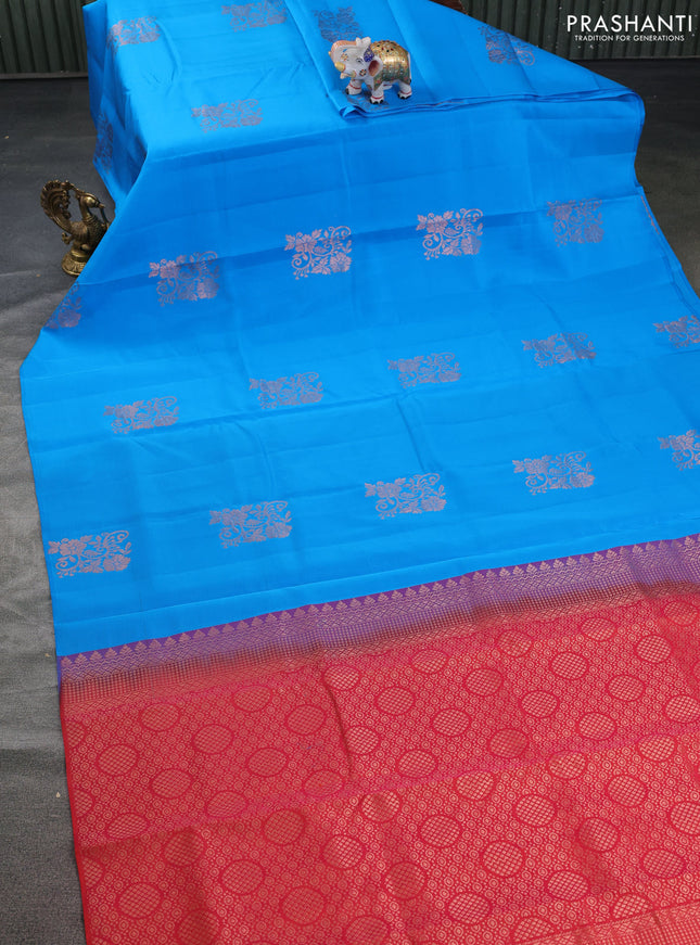 Kanchipuram silk saree cs blue and dual shade of pinkish orange with copper zari woven buttas in borderless style