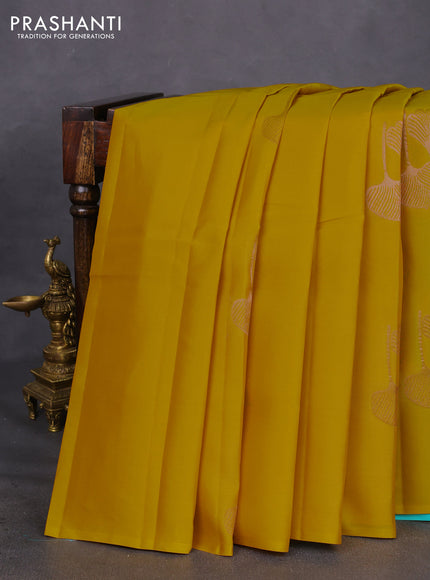 Kanchipuram silk saree yellow and teal blue with copper zari woven buttas in borderless style