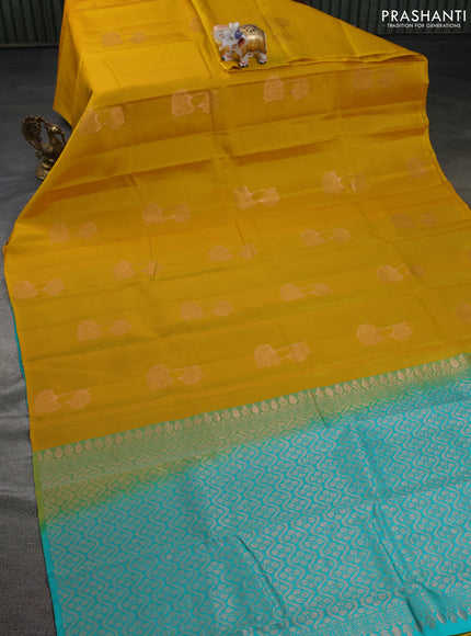 Kanchipuram silk saree yellow and teal blue with copper zari woven buttas in borderless style
