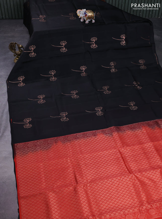 Kanchipuram silk saree black and pinkish orange with copper zari woven buttas in borderless style